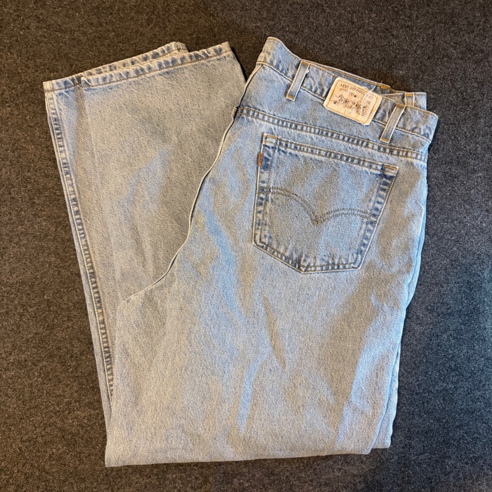 Vintage Levis 550 Loose Fit Jeans Mens 46x32 Light Wash Denim USA Made OrangeTab